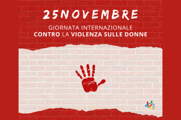 La card del nostro 25 novembre. Su sfondo rosso, in alto la scritta in bianco: 25 novembre, giornata internazionale contro la violenza sulle donne. Al centro uno squardio chiaro, sullo sfondo un muro di mattoncini e in messo il disegno di una mano rossa in segno di stop